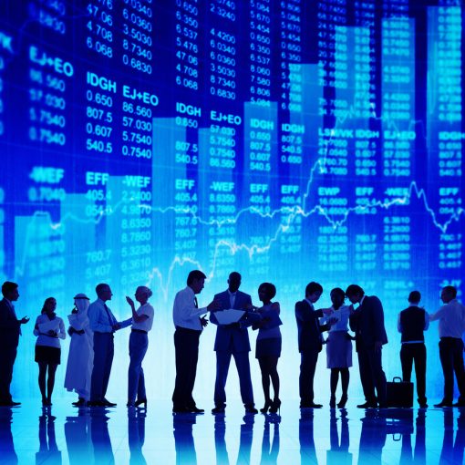 This image shows business people in discussions over stock market