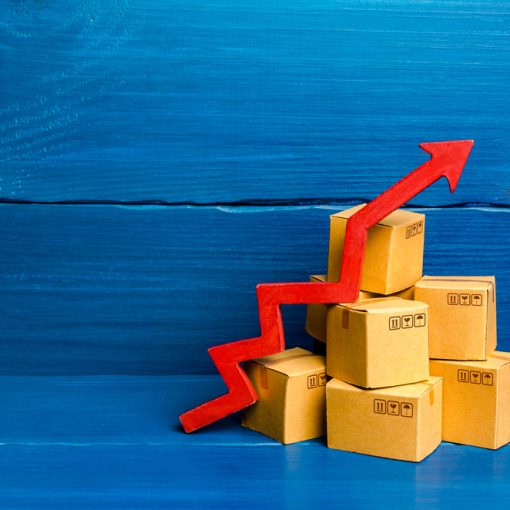 The image shows a red arrow next to packed boxes