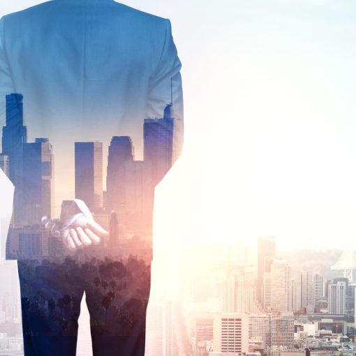 The image shows a man with building in light background