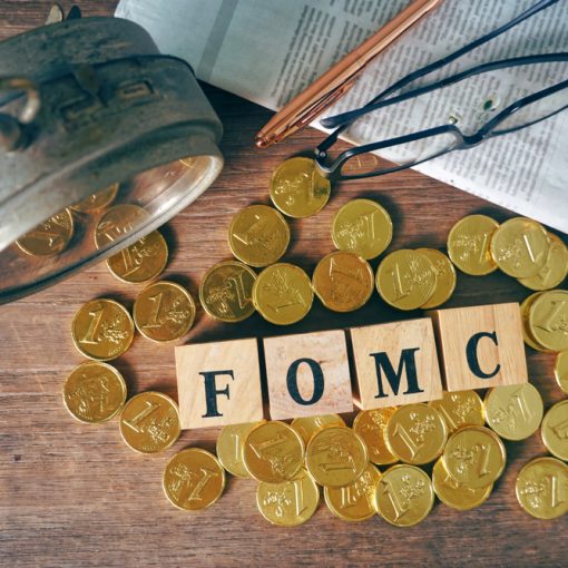 Image shows FOMC text with market news concept