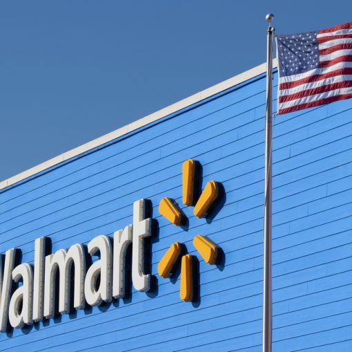 This is an image of Walmart store logo next to US flag