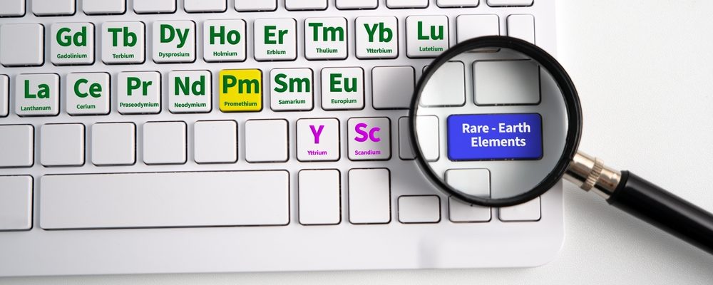 The image shows chemical symbols of rare earth elements