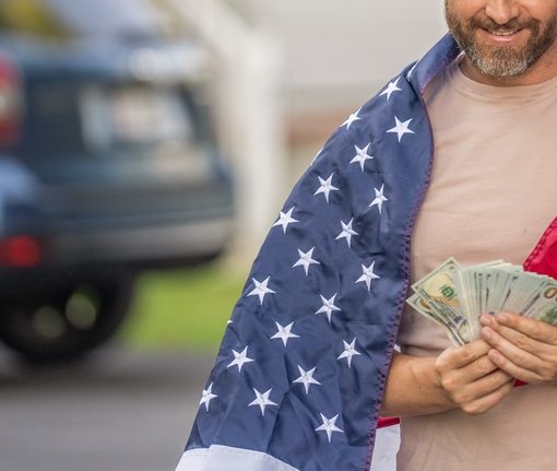 The image shows an American man with money