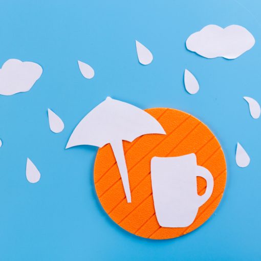 Rain on Umbrella covering Drink