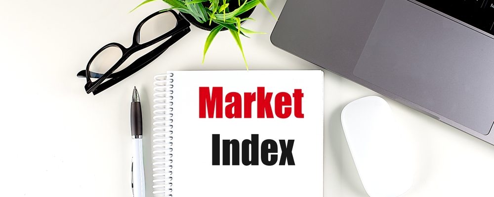 The image shows market index text on notebook