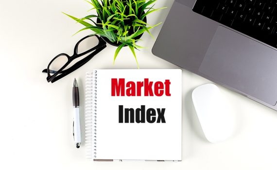 The image shows market index text on notebook