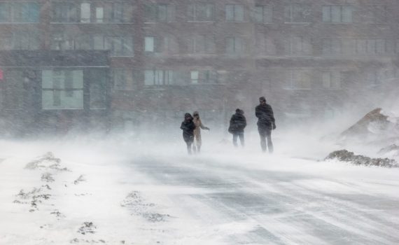 The image shows people in a Snow and Wind Storm