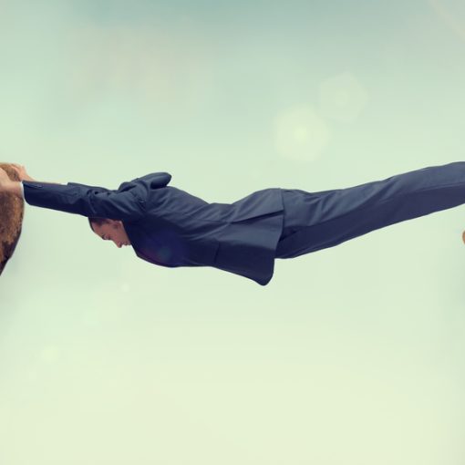 Businessman Between Rock And Hard Space