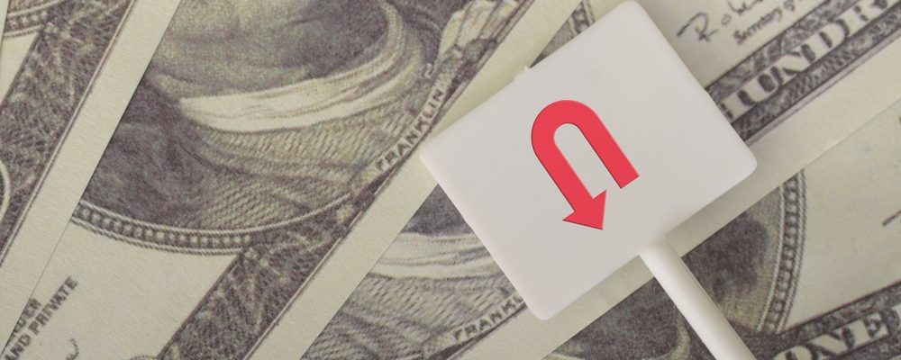 U-turn Sign On Dollar Bills