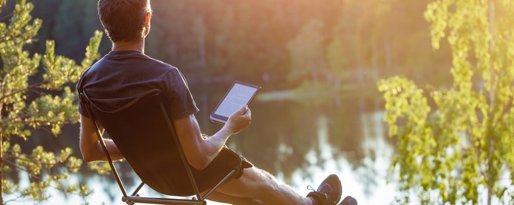 Man Reading, Thinking and Relaxing in Nature