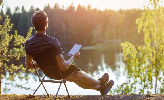Man Reading, Thinking and Relaxing in Nature